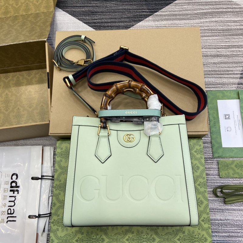 G*u*i top handle bags